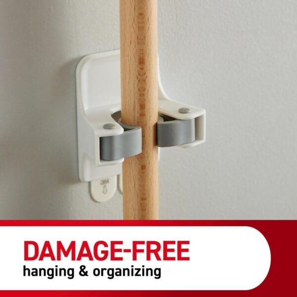 71tjAHj1l1L._AC_SL1500_.jpg Command Broom and Mop Grippers, 2 Hangers and 4 Command Stri...