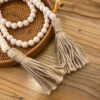 Farmhouse Beads 58in Wood Bead Garland with Tassels Rustic C...